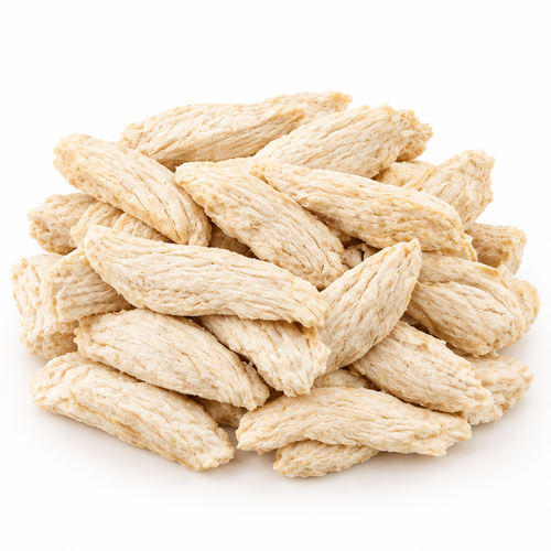 Professionally photographed freeze-dried chicken breast pieces on a white background